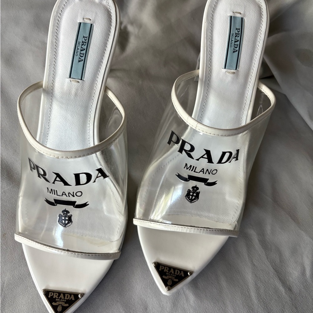 Prada White Mules with Elegant Design